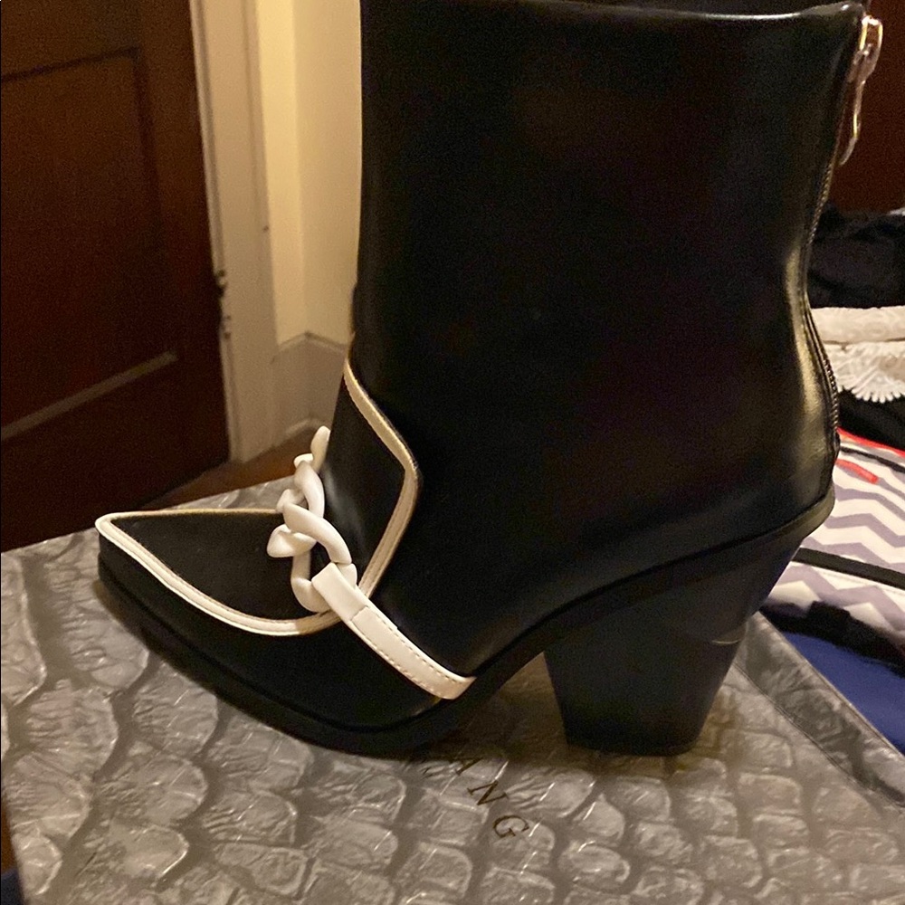 Chic Black Ankle Boots with White Trim